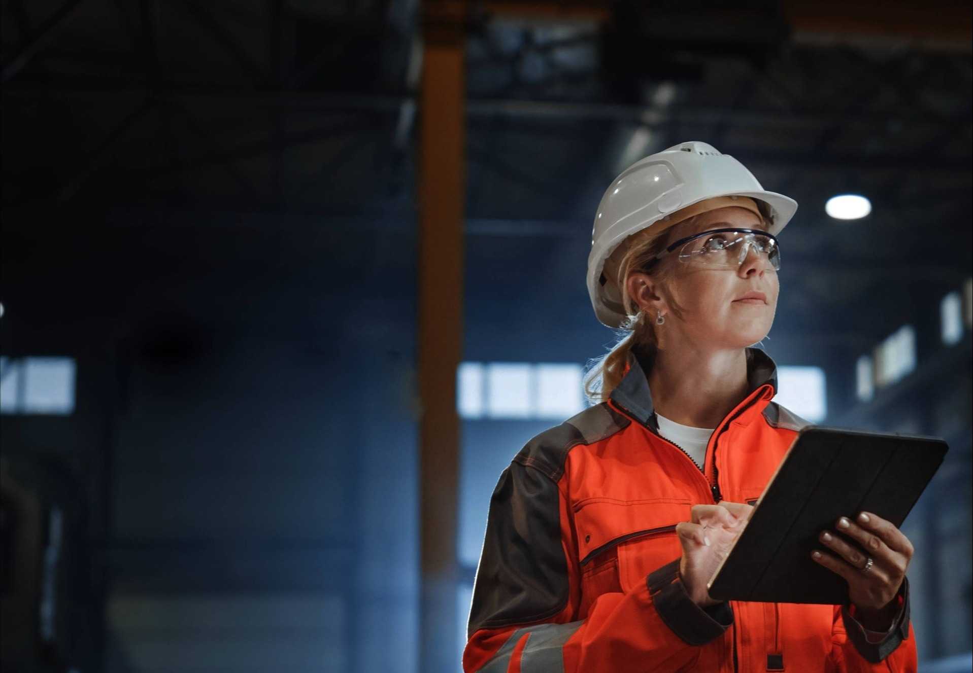 construction worker in a dark warehouse